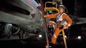 Luke Skywalker climbs into his X-Wing